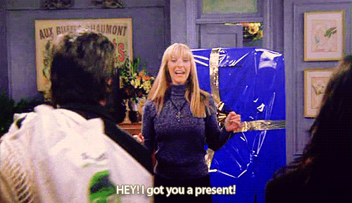Phoebe from Friends 'I got you a present' GIF